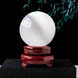 Small selenite crystal ball with stand