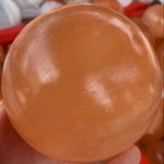 Large peach selenite sphere