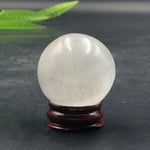 Small selenite globe with stand