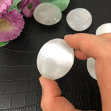 Selenite palm stones