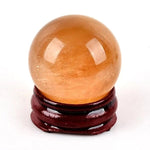 Orange selenite sphere with stand