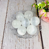 Magical selenite tumbled spheres