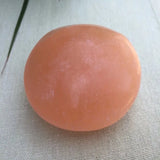 Red selenite palm stone