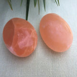 Red selenite palm stone