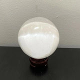 Selenite sphere with holder
