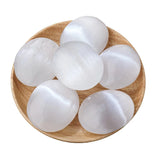 Selenite meditation palm stone