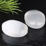 Silver selenite palm stone