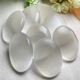 Oval shape selenite palm stone