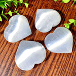 Heart shaped selenite palm stone