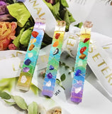 Three rainbow dyed satin spar crystal points.