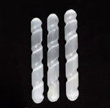 3 white wands with a smooth and silky finish.