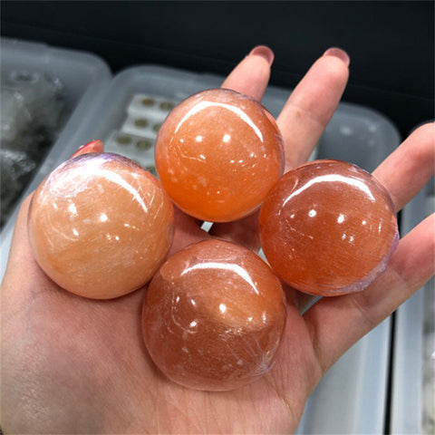 Peach selenite sphere