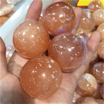 Peach selenite sphere