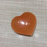 Orange heart shaped selenite