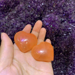 Orange heart shaped selenite
