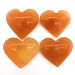 Orange heart shaped selenite